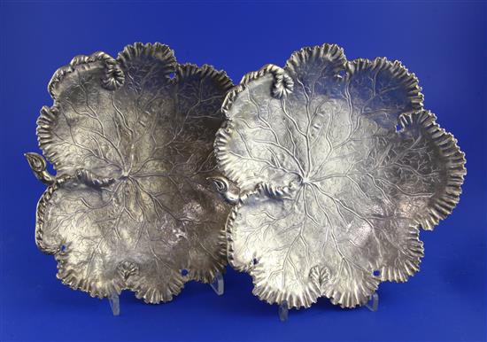 A good pair of Victorian silver dishes by John Samuel Hunt, each modelled and decorated as a leaf, 28 oz.